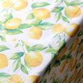 Hvid bomuldsdug med citroner, størrelse 240x140 cm, til borddækning, fra Servietringen, 100% bomuld.